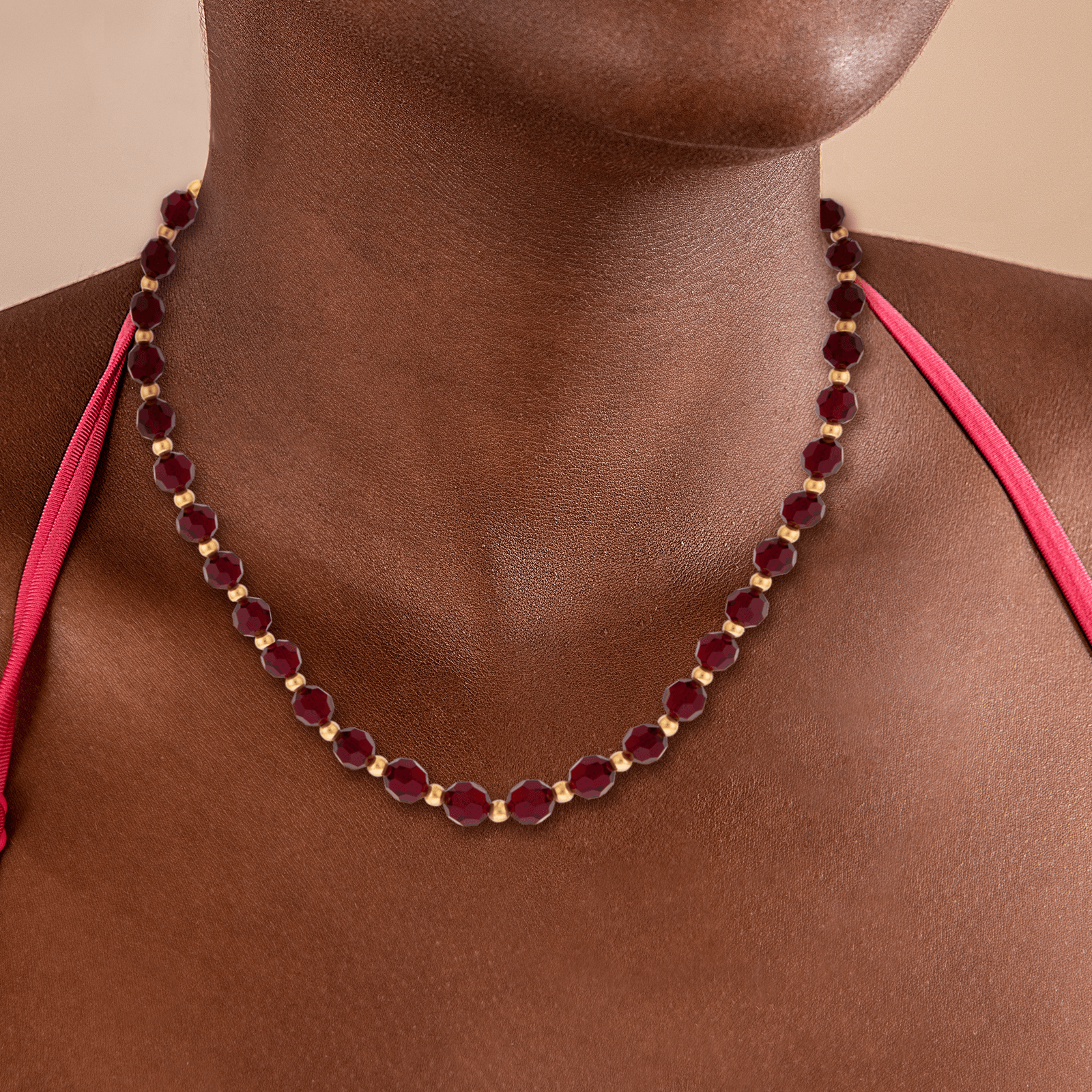 Collier chaîne or grain d'or et cristal grenat